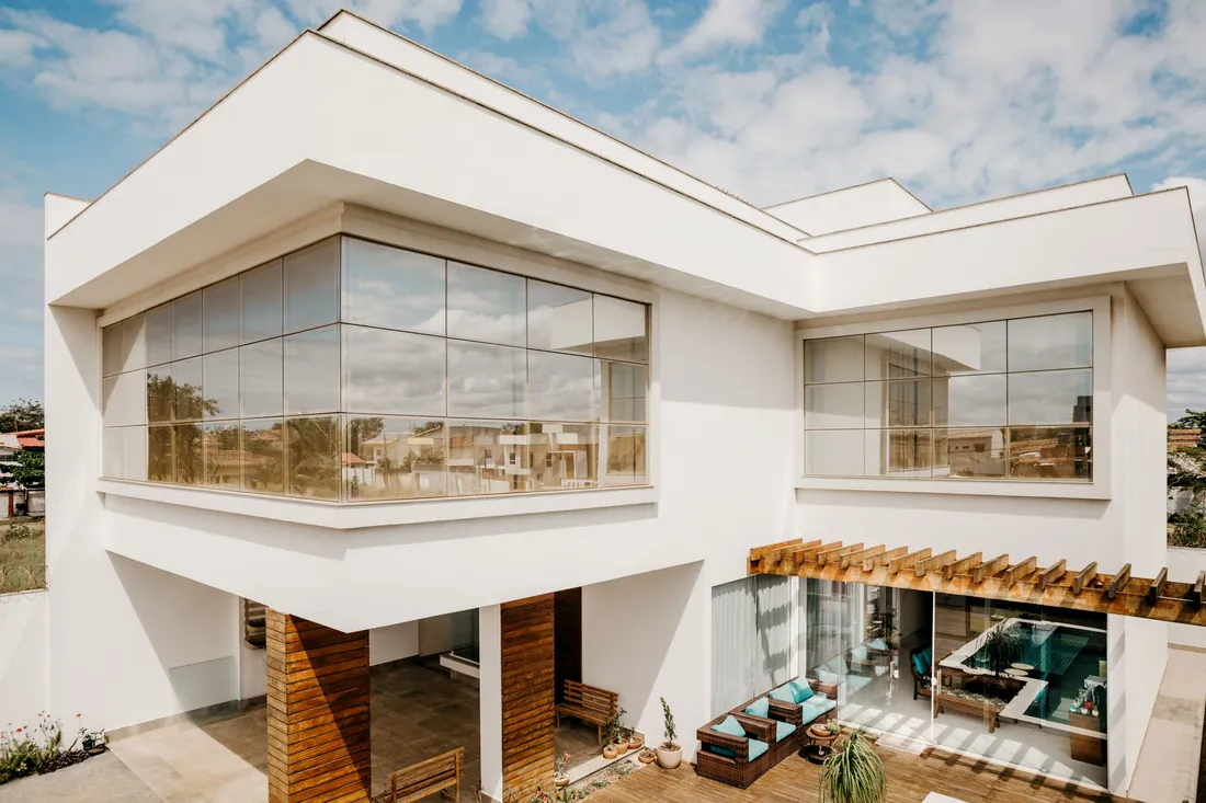Stock photo: a white contemporary home exterior; not company work.